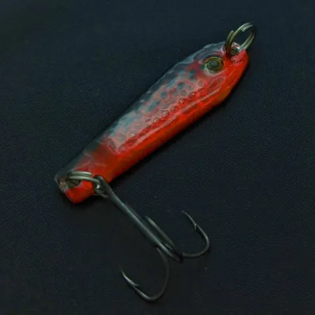 Renosky bloody jig, 12g röd/svart, metallbete #24292