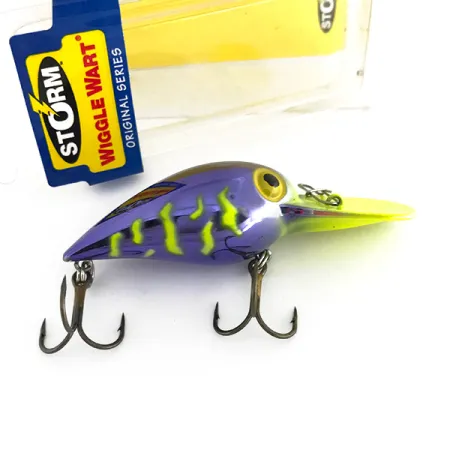 Storm Wiggle Wart Wobbler, Lila / Fluo Gul, 11g, Rassel, #7944